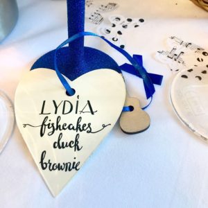 Wedding table place setting close up calligraphy menu card