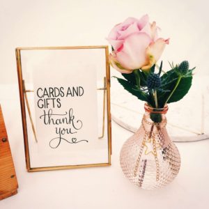 Cards and gifts calligraphy sign in a frame